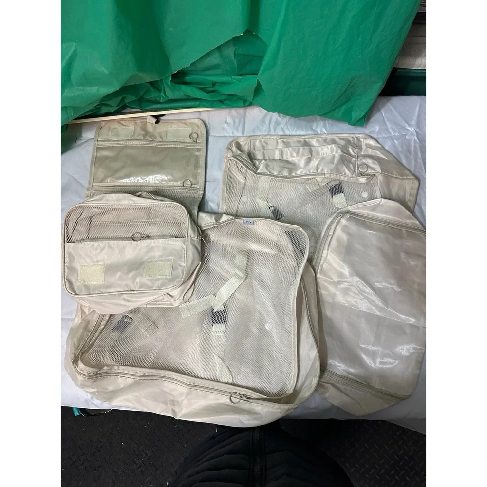 7-Piece Travel Organizer Set w/ Packing Cubes, Toiletry Bags &‎ First Aid Case